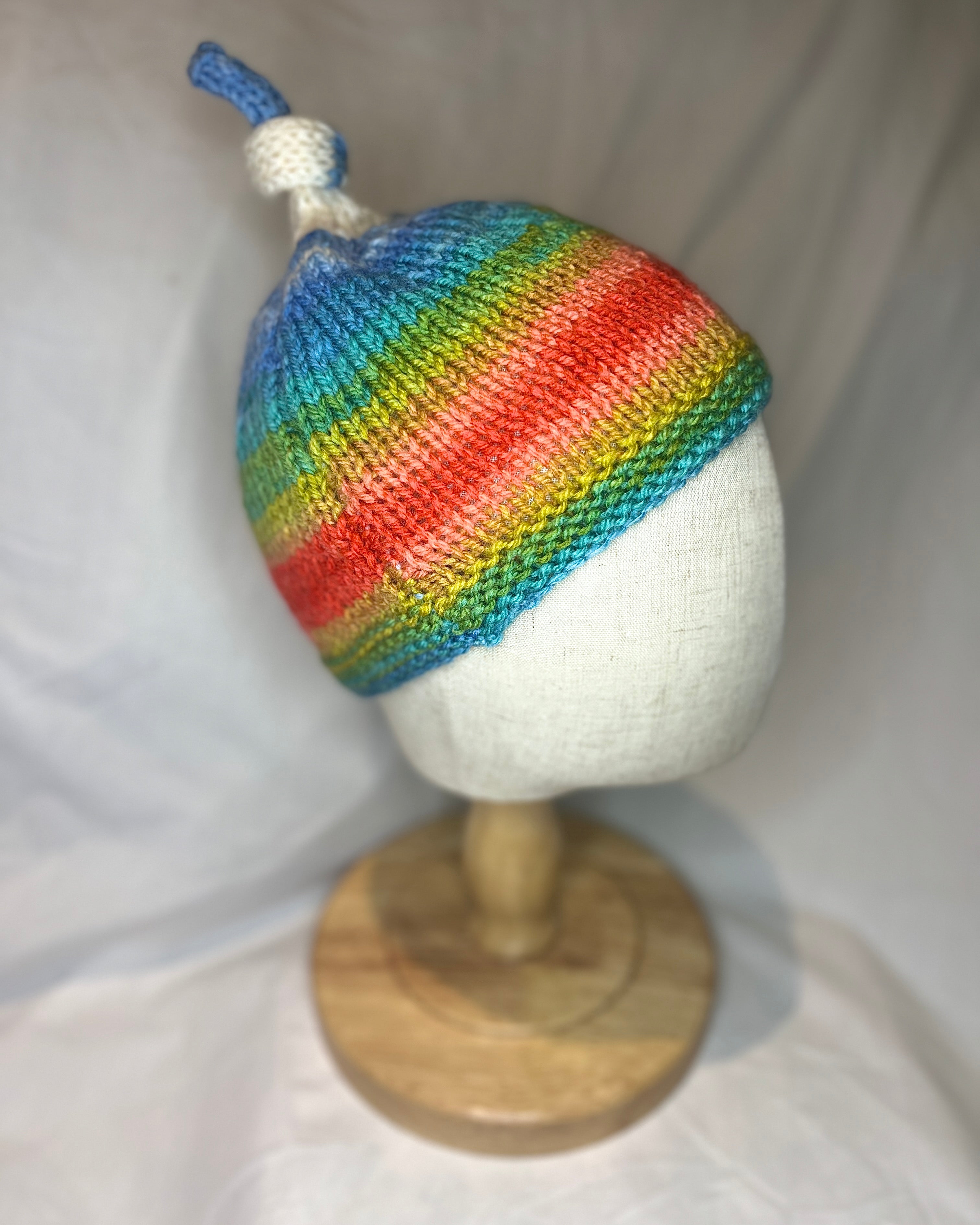 Rainbow Top Knot Beanie